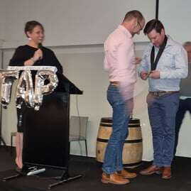 Brett receiving TAP award