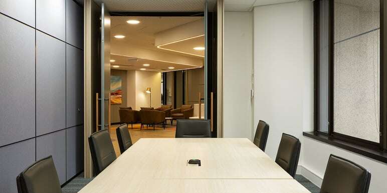 meeting room black seating chairs brown lamp