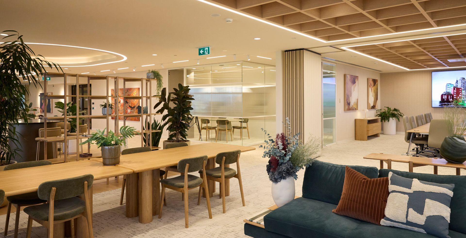 Collaborative workspace and meeting areas within Knight Frank Melbourne office.