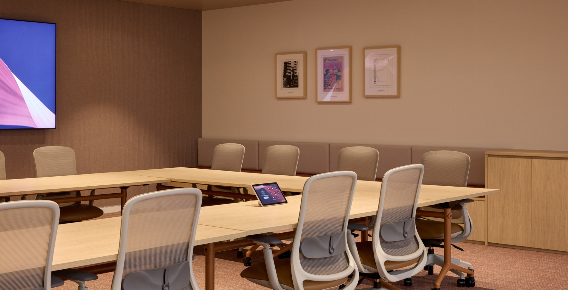 IRT boardroom with modular tables, video conferencing technology and coastal-inspired finishes
