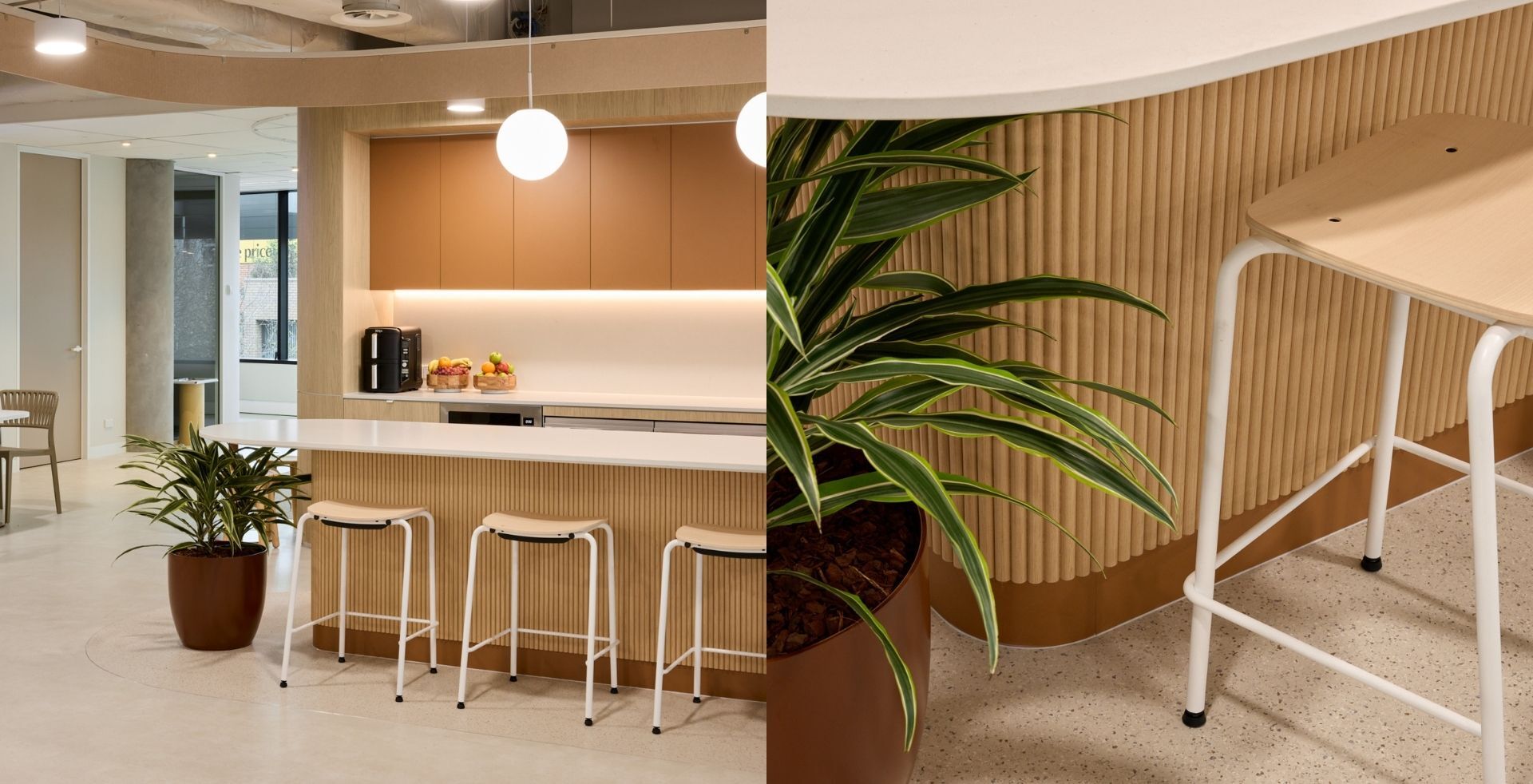 IRT workplace kitchen by Amicus with natural timber, indoor planting and warm tones inspired by the Illawarra landscape