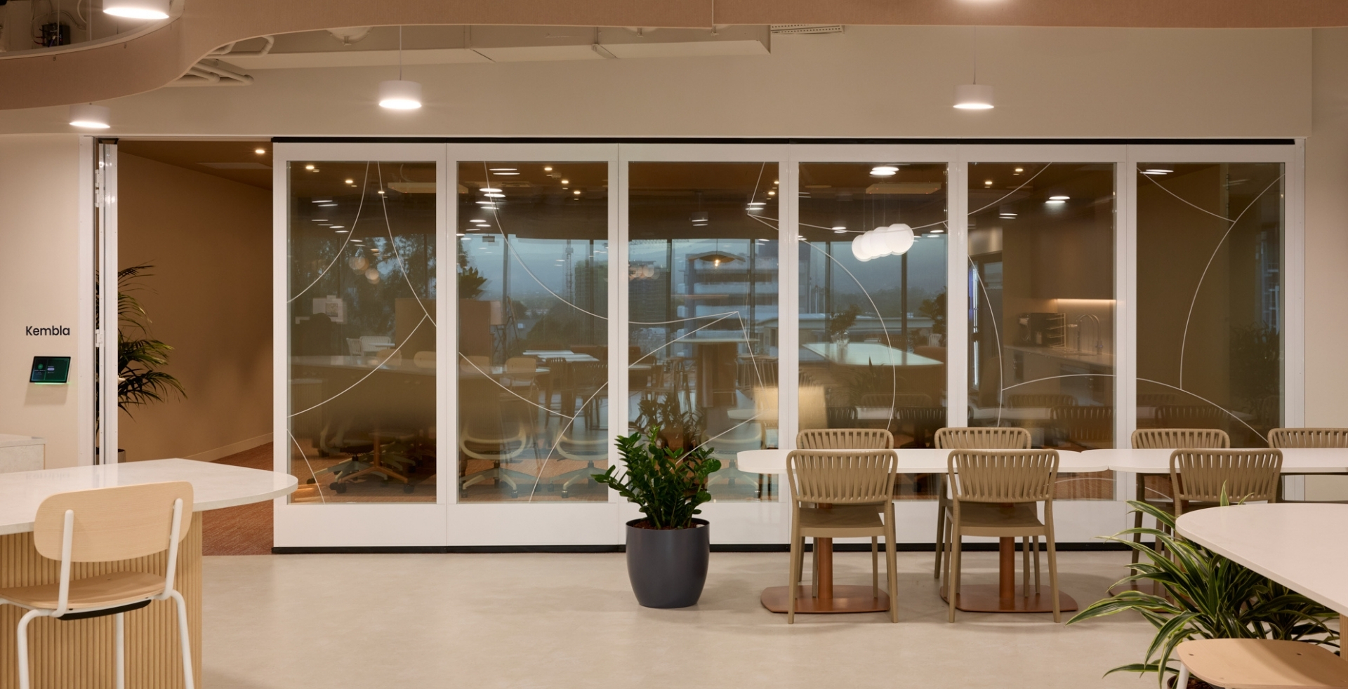 Enclosed IRT boardroom with operable glass walls and detailing inspired by the Illawarra coastline