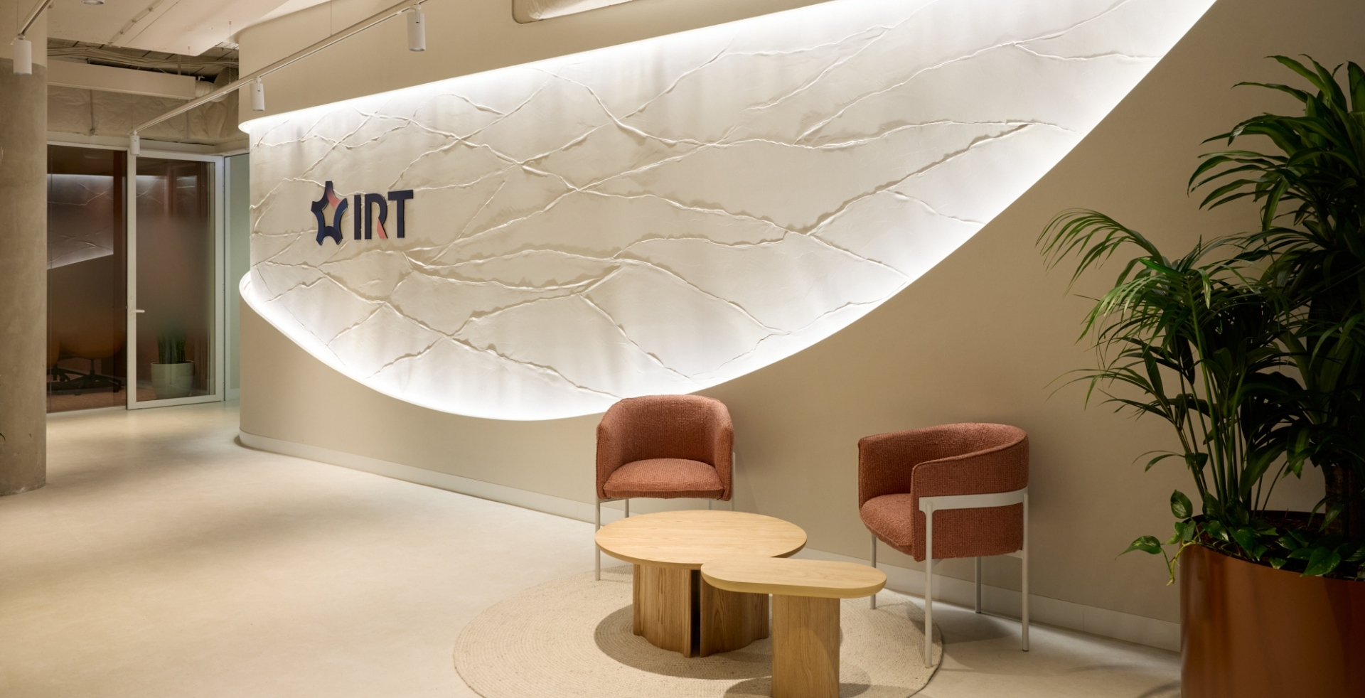 IRT reception designed by Amicus with an illuminated feature wall inspired by the Illawarra escarpment