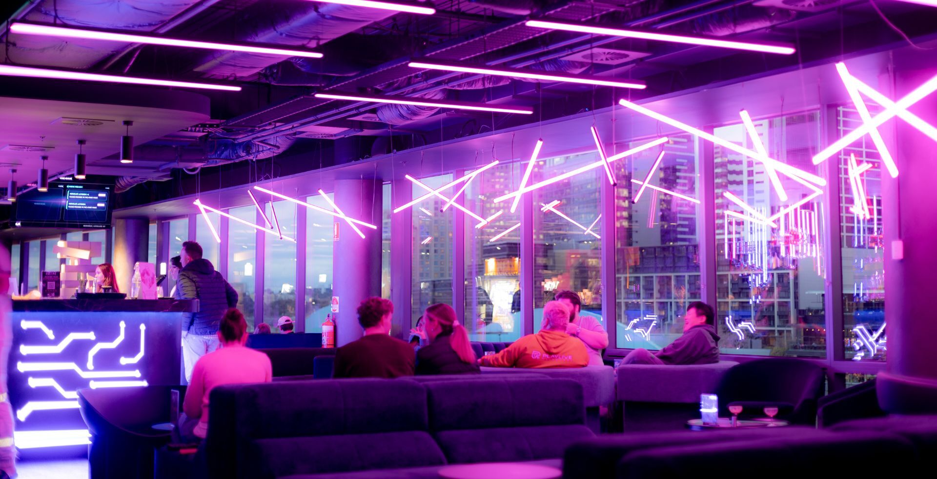 Scattered neon tubes above the lounge and bar at The Great Escape, cyberpunk scheme by Chad&Wick
