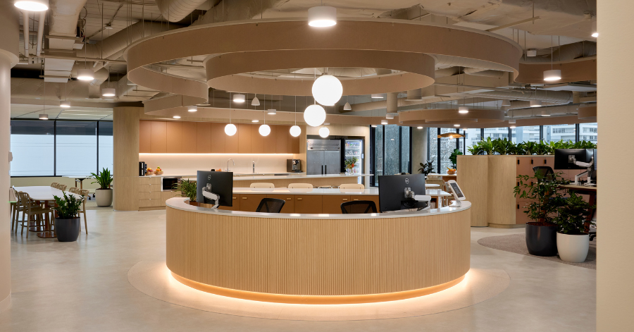 Soft timber reception desk with integrated technology