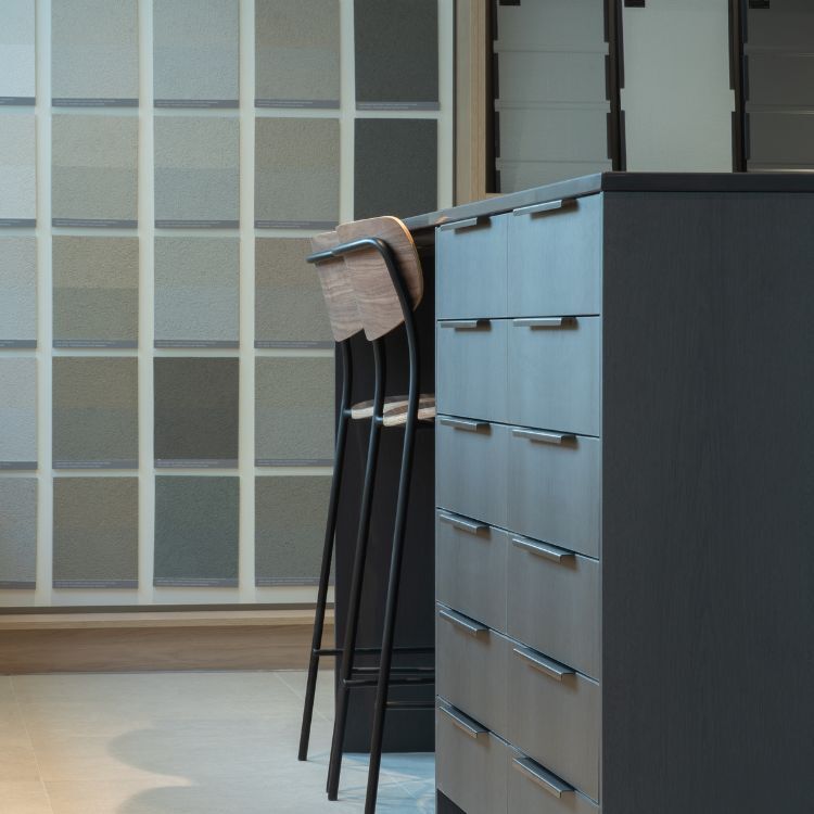 Joinery and material sample displays within the showroom.