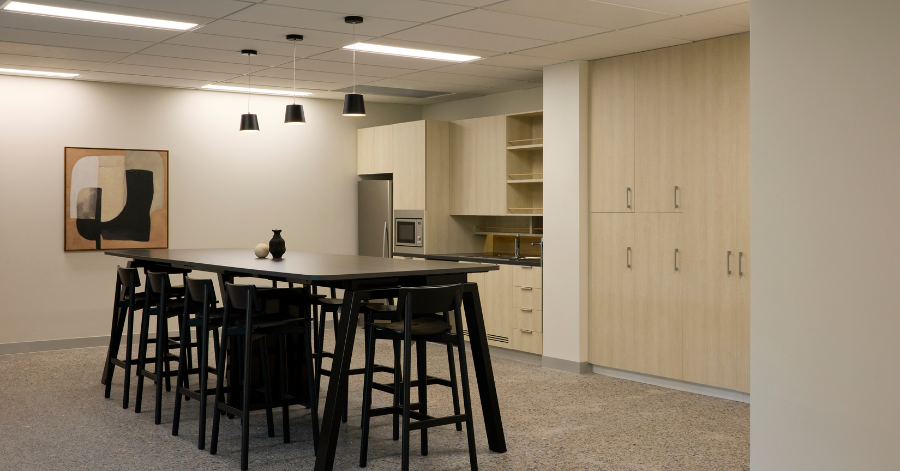 A contemporary office kitchen and breakout area inside the Kyko Spec Suite
