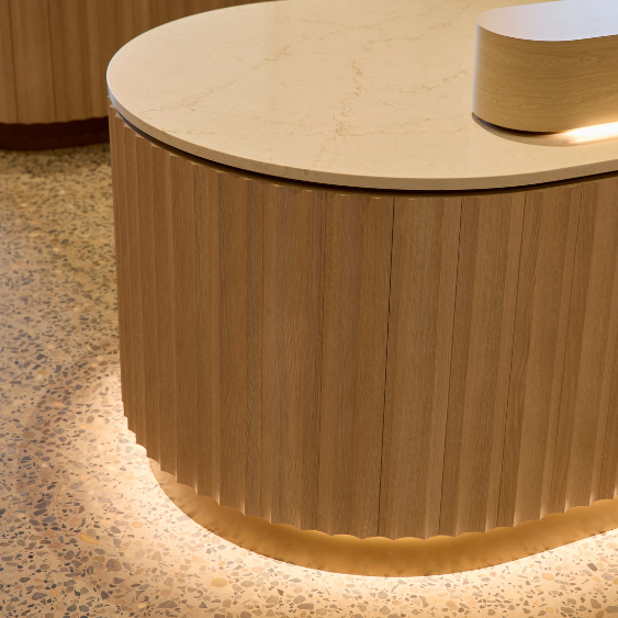 Detailed shot of fluted white oak timber paneling Kyko spec suite