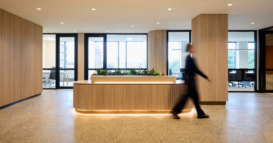 Warm and elevated office reception design by Amicus