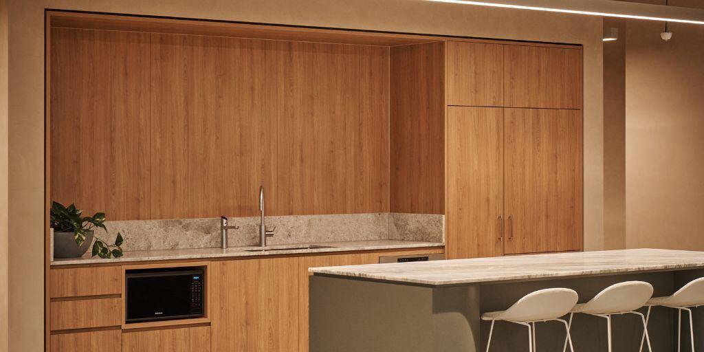 timber feature wall in office kitchen