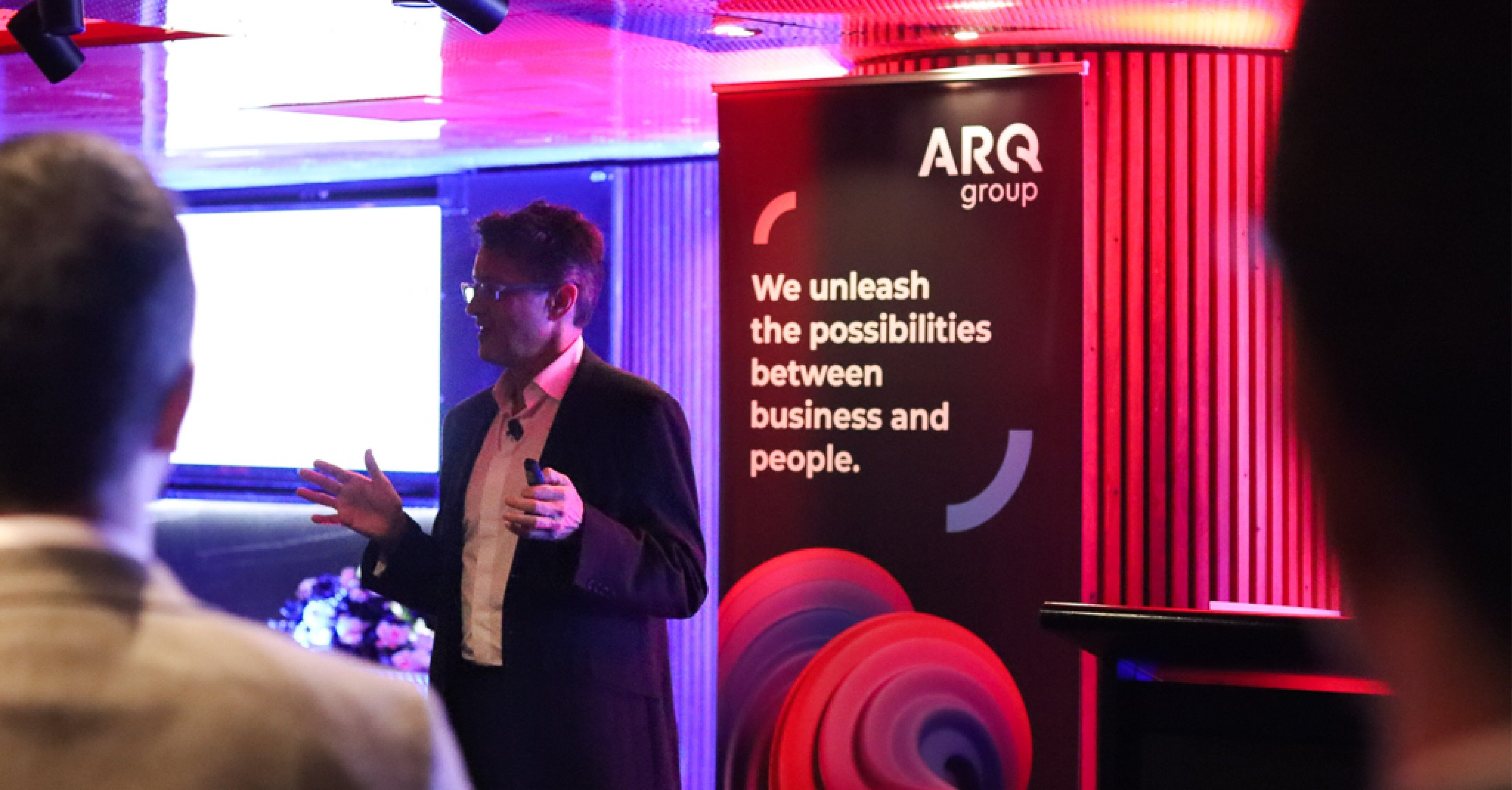 Spokesman from ARQ giving a presentation