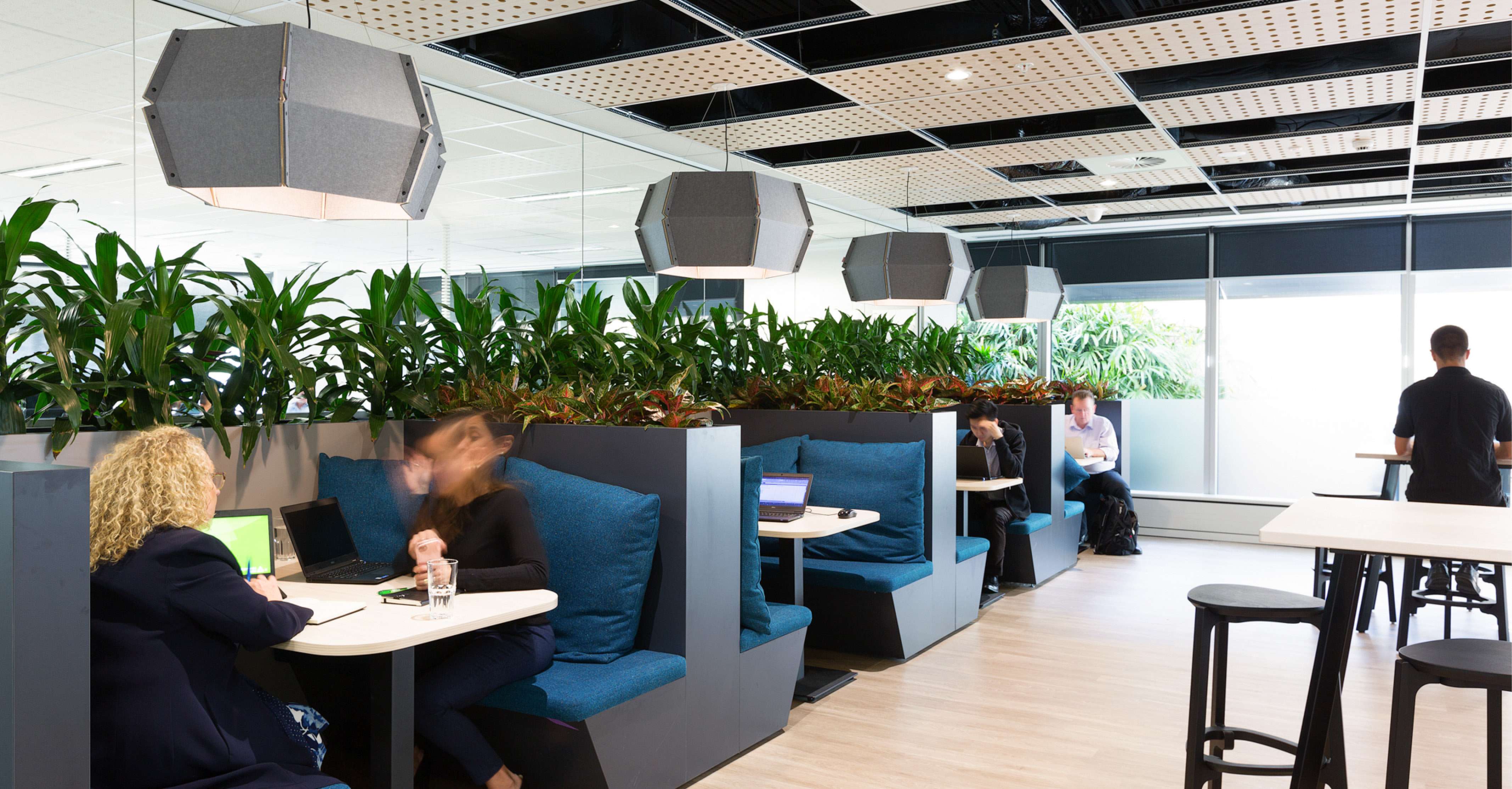 Lively breakout space with people working