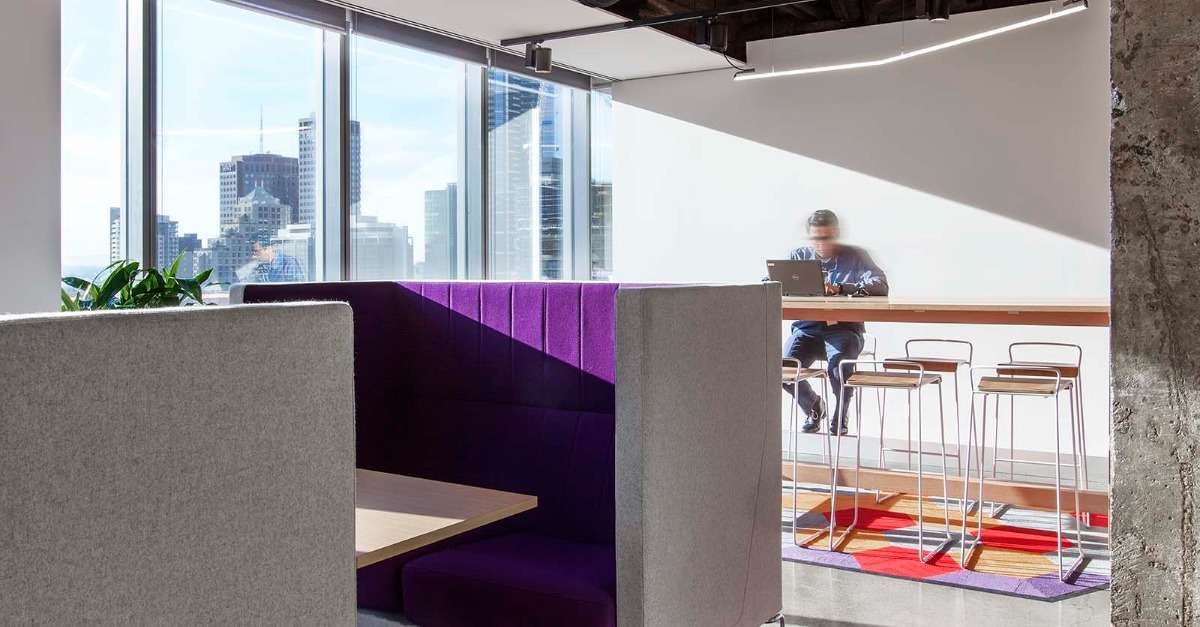 man in hybrid working office