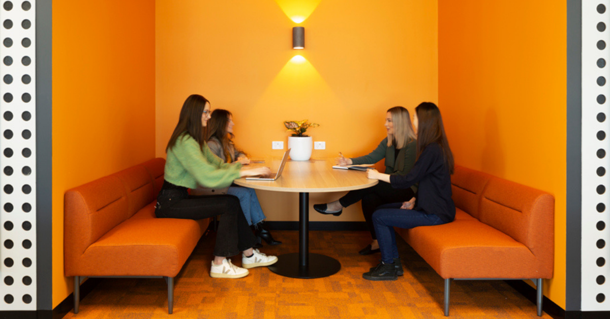 HR managers in hybrid work meeting