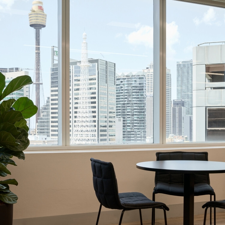 Open kitchen breakout with view of Sydney CBD