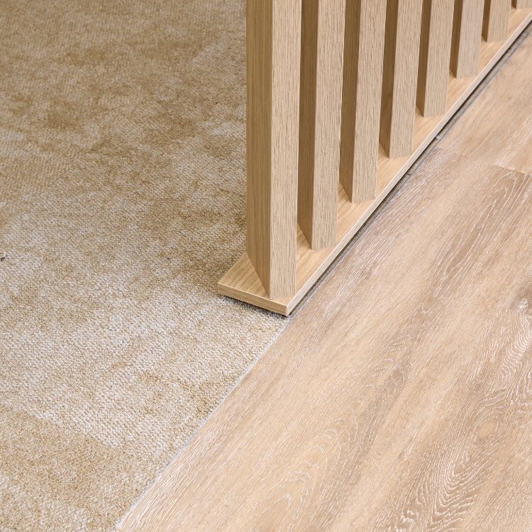 Detailed close-up shot of timber, carpet and flooring