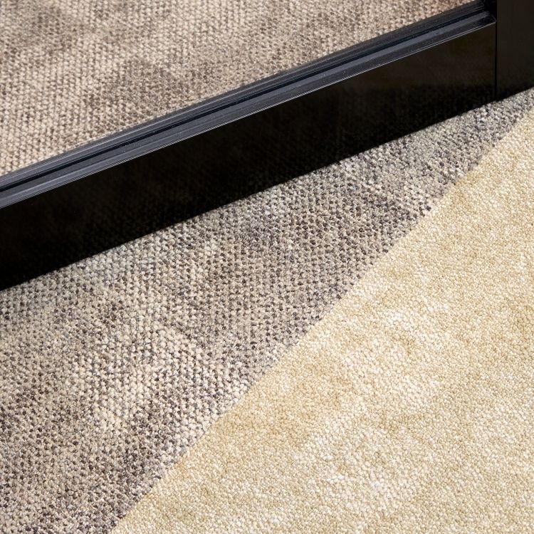 Detailed close-up shot of metal framing and dual carpet