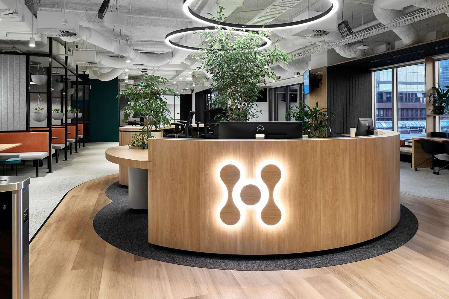 Hydro Tasmania reception desk with glowing Hydro Tasmania logo on it.