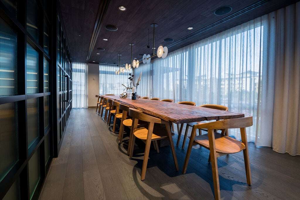 rustic timber boardroom table and chairs