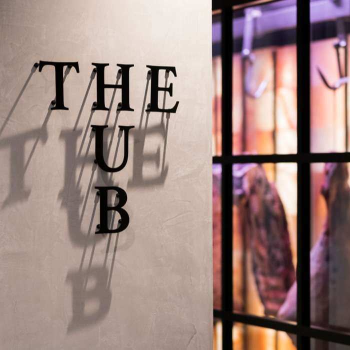 The words 'THE HUB' attached to the wall of Kilcoy Global Foods' office.
