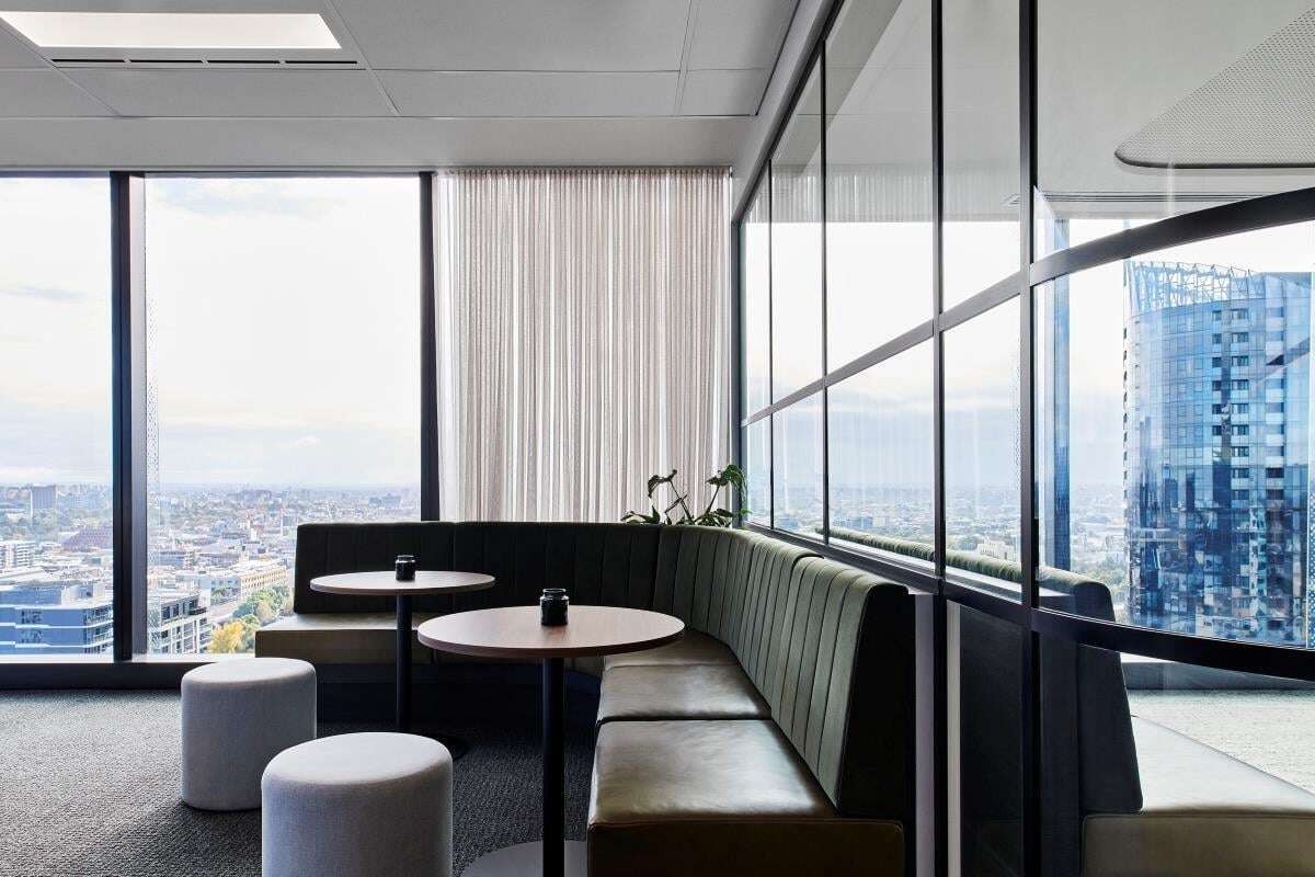 Contemporary dining area with incredible views from Melbourne Tradeflex office.