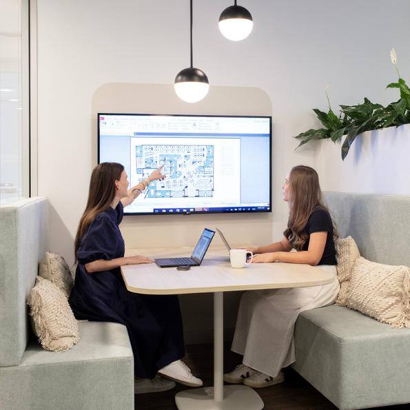 people in a hybrid workplace 